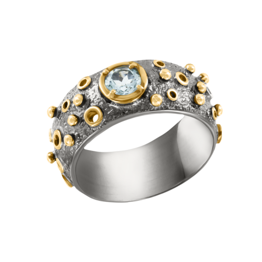 Women's ring with topaz and gilding 