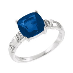 Women's ring with diamonds and London blue topaz 