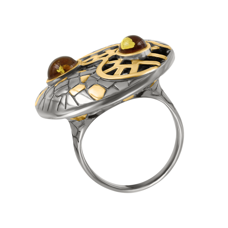 Women's ring with amber and gilding 
